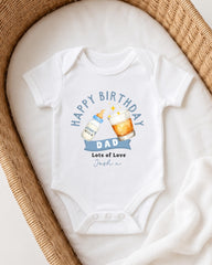 A white onesie with a birthday message and illustrations of a bottle and a glass of beer.