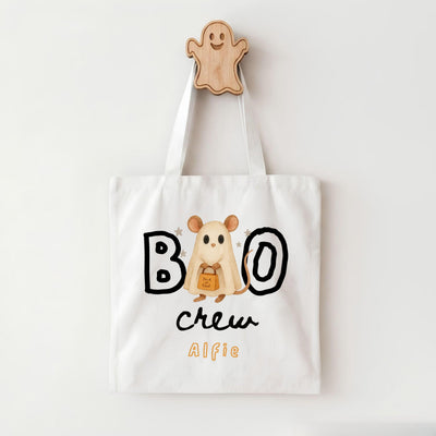 A white tote bag with a Halloween-themed design, featuring a ghost character and the text "BOO crew Alfie".