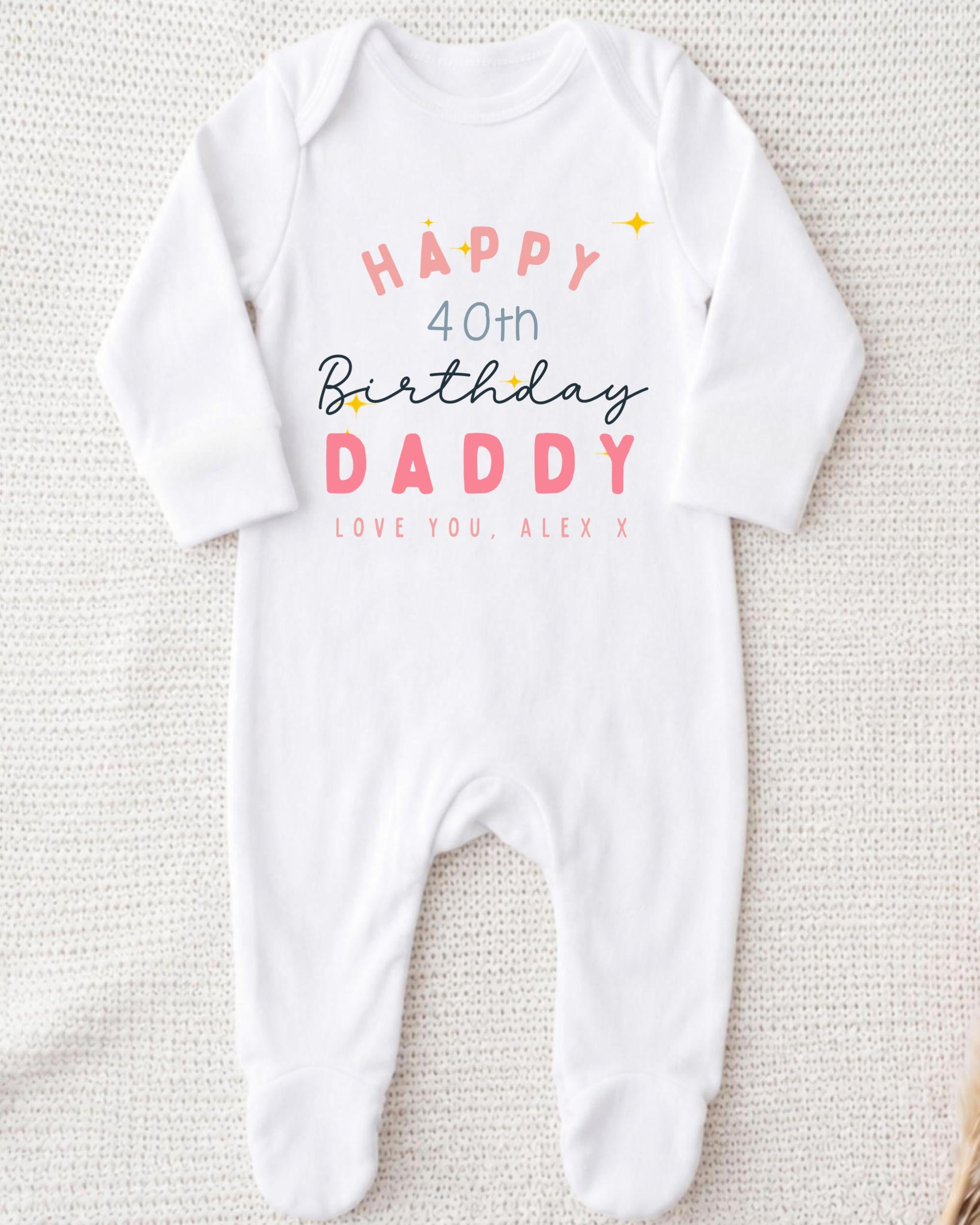 A white onesie with text and graphics printed on it, celebrating a 40th birthday for a father.