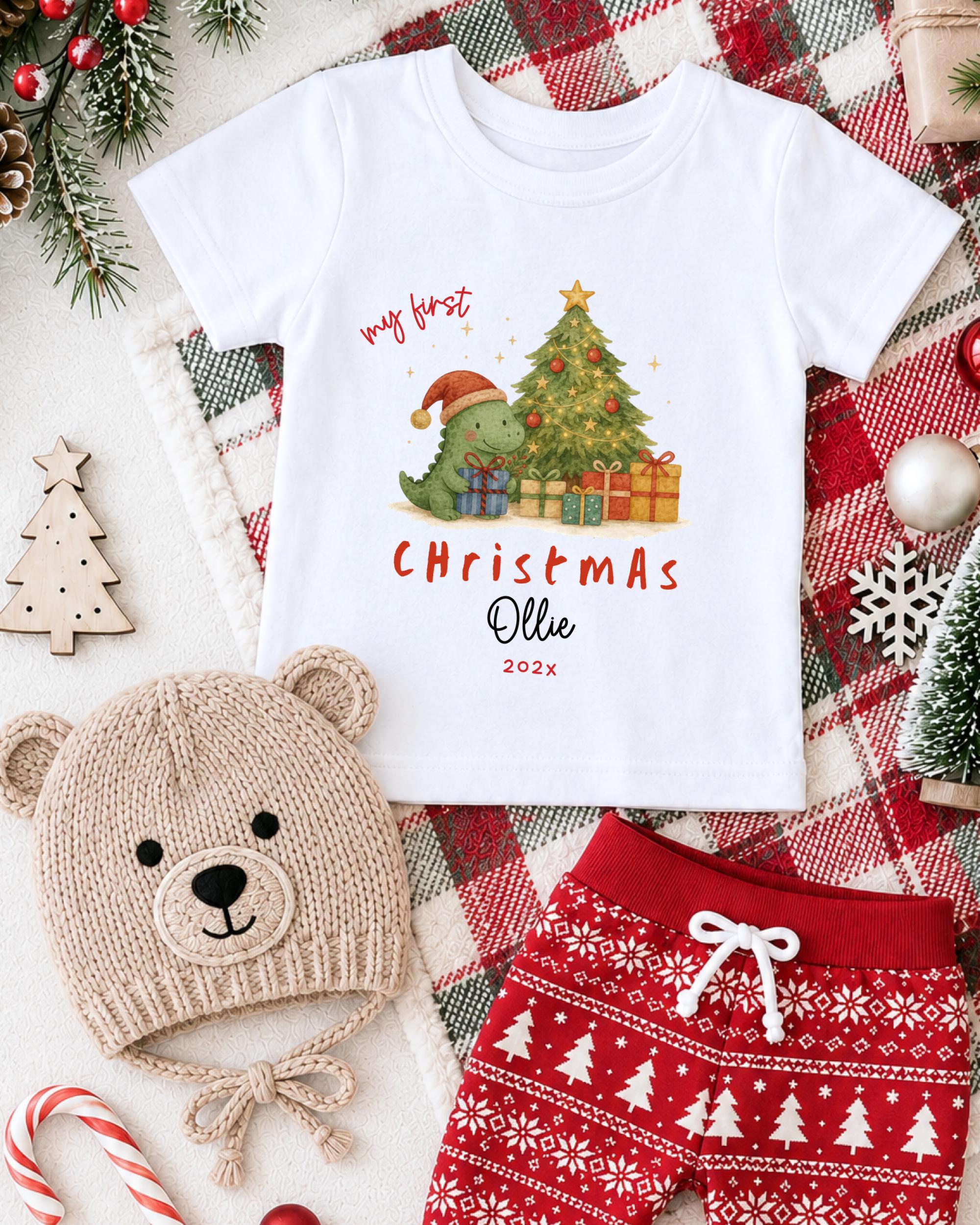 A white t-shirt with a Christmas-themed graphic, a beige knit hat, red shorts, and various Christmas decorations such as a Christmas tree, ornaments, and a snowflake.
