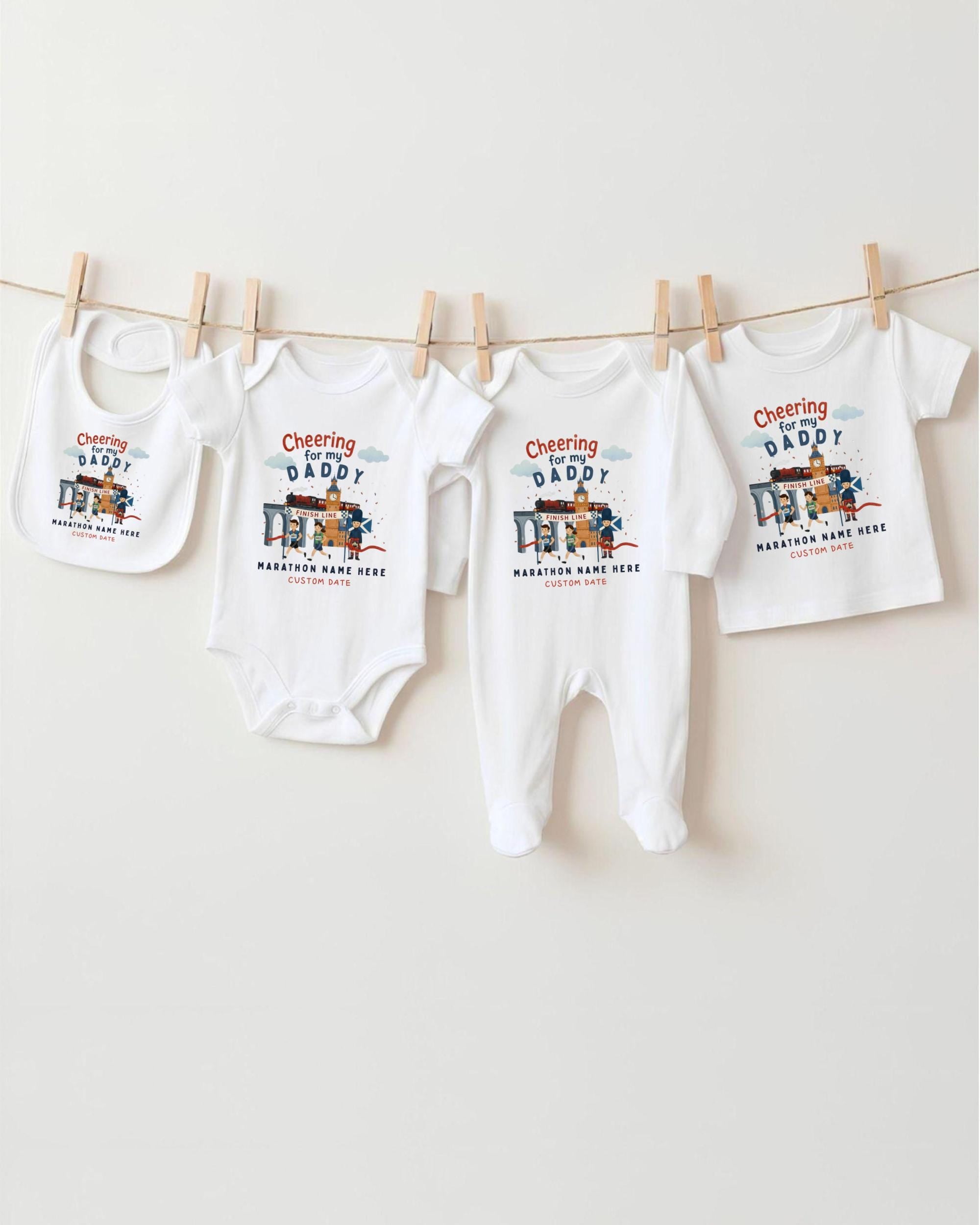 A row of four white baby clothes, including onesies and bibs, hanging on a clothesline.