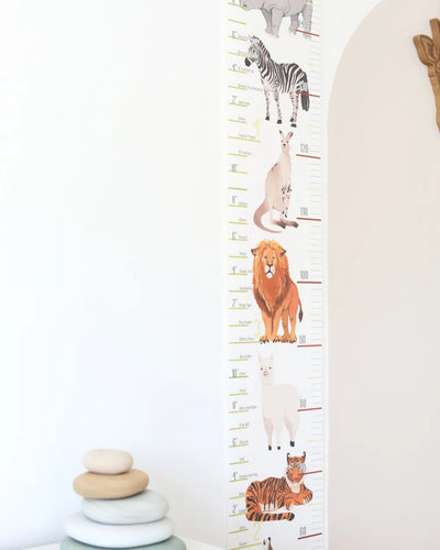 a child's height chart with animals on it