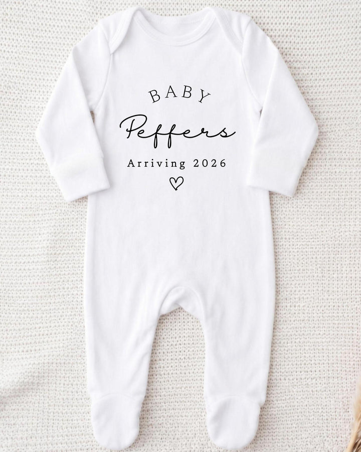 Personalised white Baby Grow with black 'Baby Peppers Arriving 2026' pregnancy announcement text and a heart for pregnancy announcement