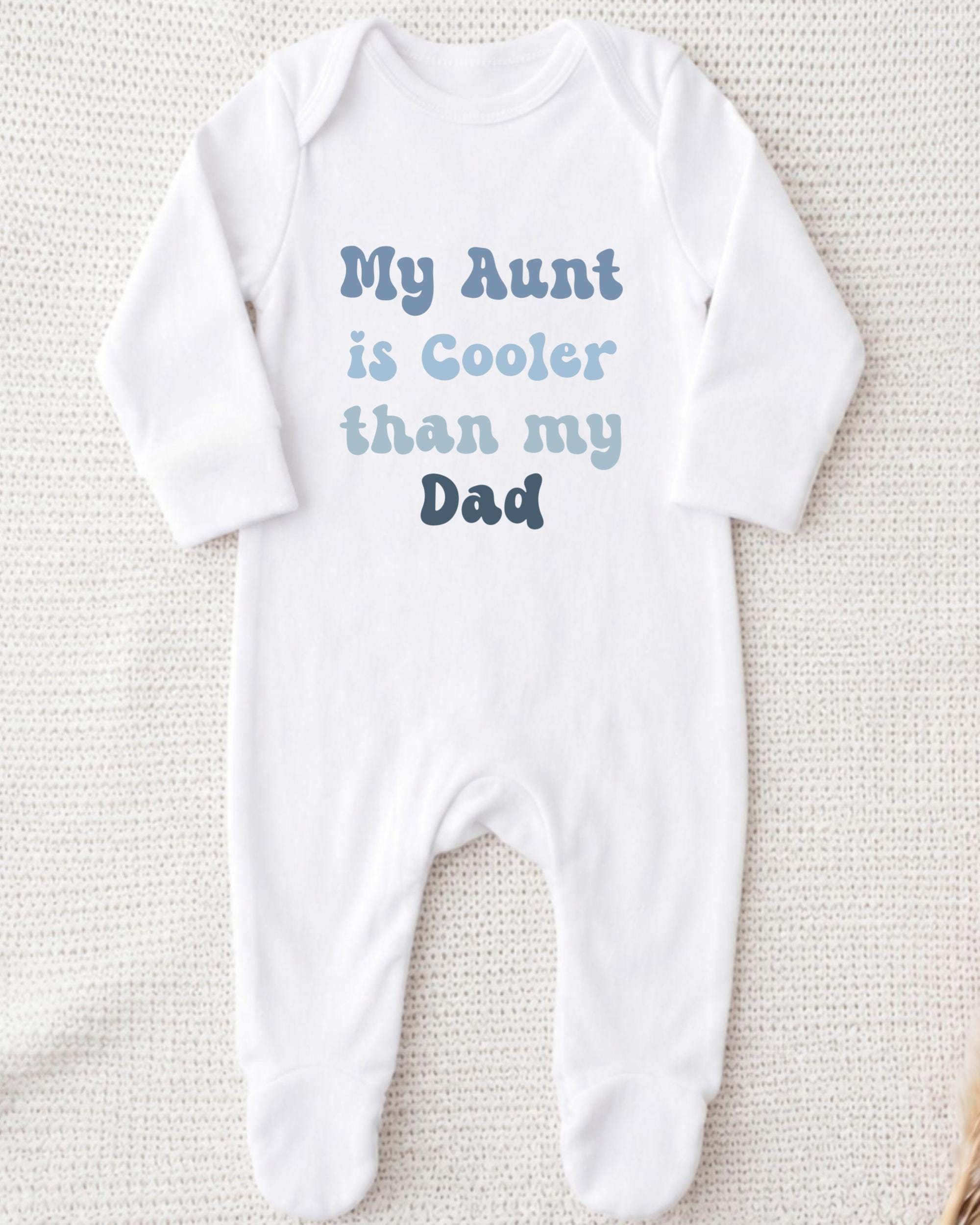 A white onesie with text printed on it.