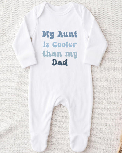 A white bodysuit with text printed on it.