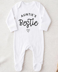 A white onesie with the text "Auntie's Bestie" printed on it.