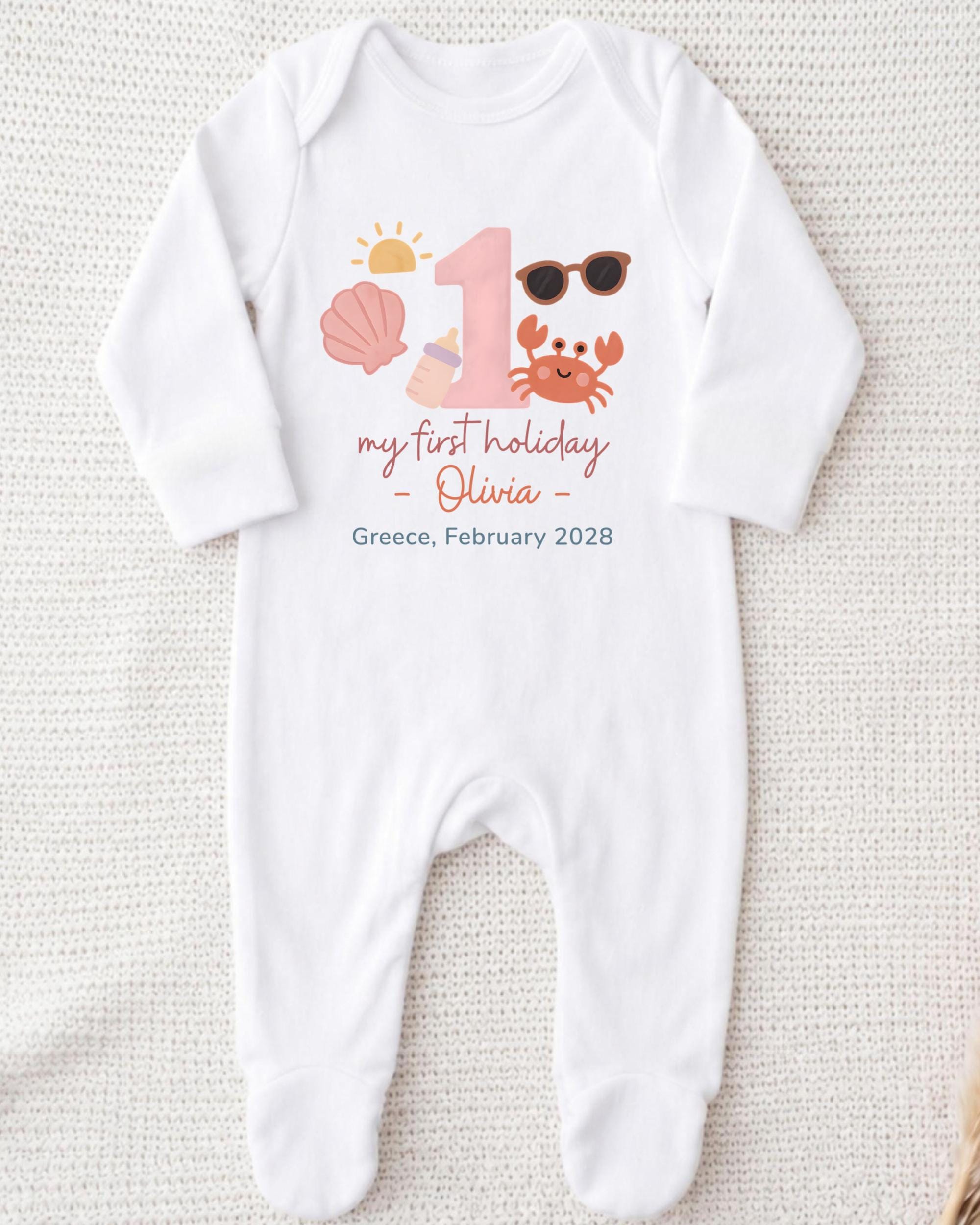 A white onesie with a personalized design and text printed on it.