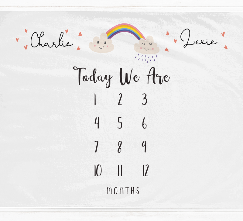 a calendar with a rainbow and clouds on it