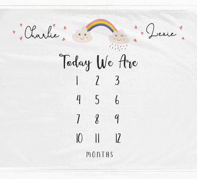 a calendar with a rainbow and clouds on it