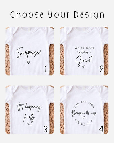 four different white t-shirts with various phrases and designs printed on them.