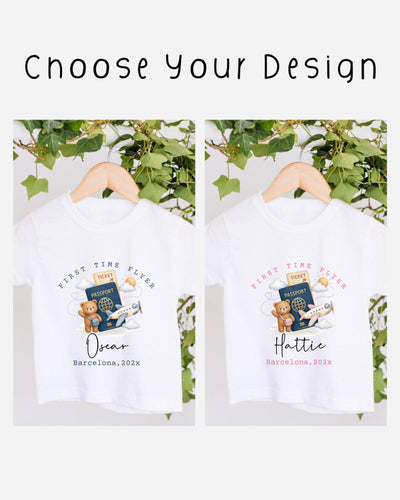 two white t-shirts with a design featuring a teddy bear, a passport, and a suitcase, along with the text "First Time Flyer Oscar Barcelona, 20x" and "First Time Flyer Hattie Barcelona, 20x".