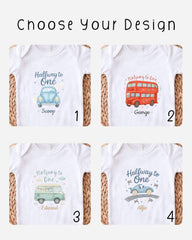 four different baby onesies with unique designs, each featuring a different vehicle or character.