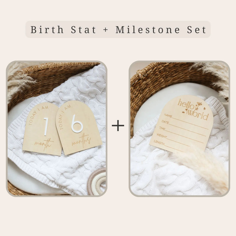 a set of two wooden tags sitting on top of a table