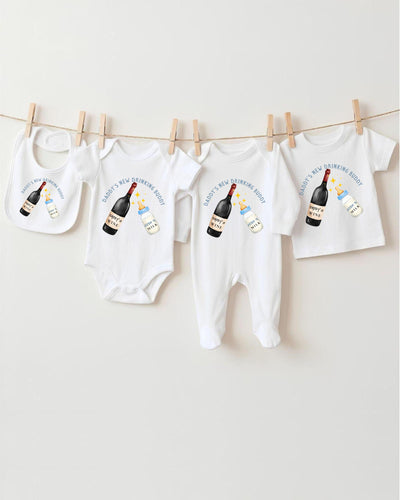 a collection of baby clothes and bibs hanging on a clothesline, with each item featuring a wine bottle graphic.