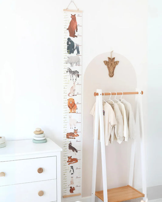 a child's growth chart with animals on it