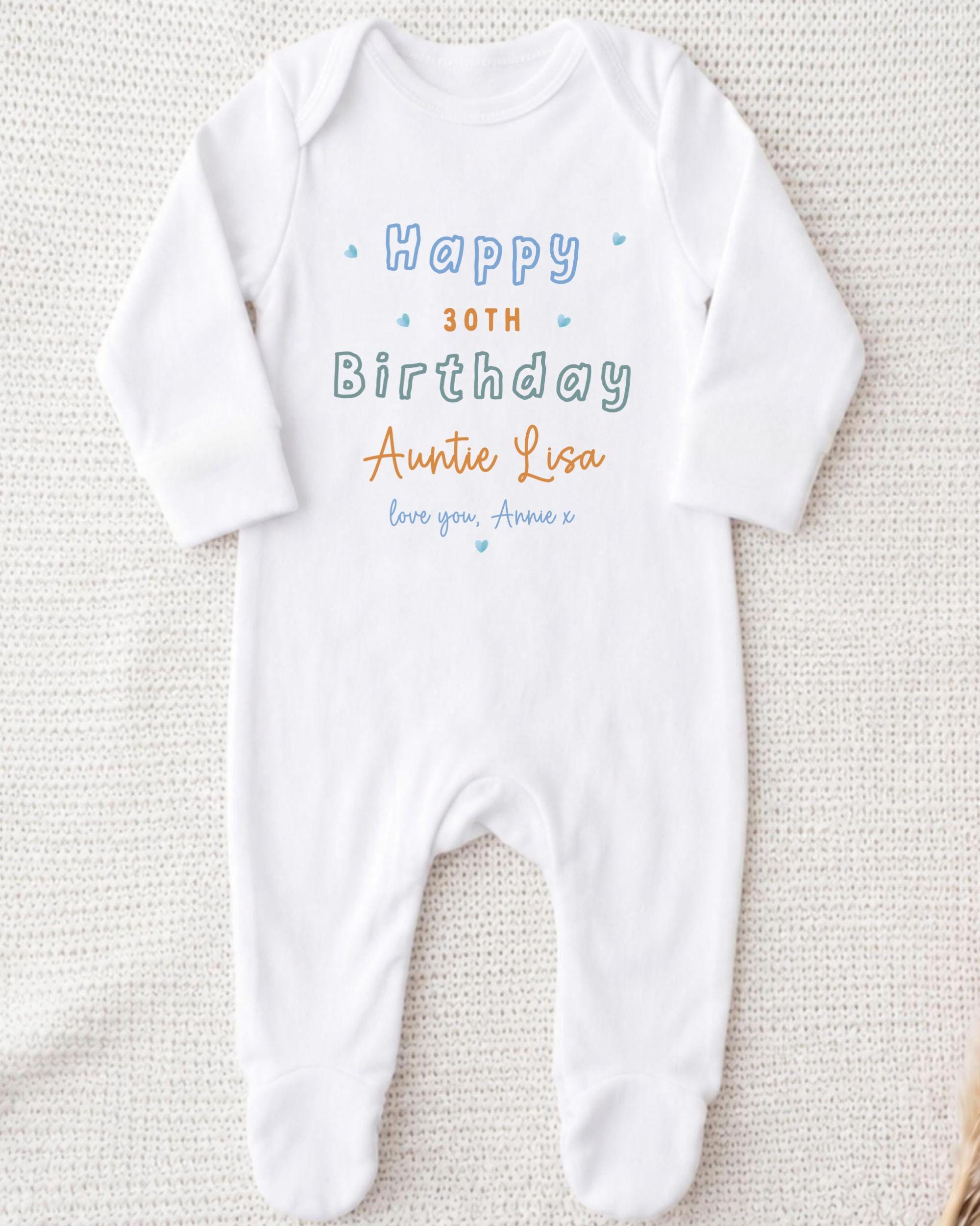 A white onesie with text printed on it, likely for a 30th birthday celebration.
